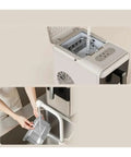 Top view of Quick Freeze Countertop Ice Maker For Home And Dorm slamming out ice cubes with water filling system.