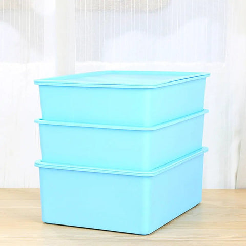 Blue Plastic Wardrobe Organizer Set 3 Piece Drawer Dividers For Underwear And Socks stacked in a tidy arrangement.