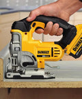 Slick 20V Max Cordless Jigsaw Kit With 4.0 Ah Battery And Fast Charger cutting through laminate at a workbench.