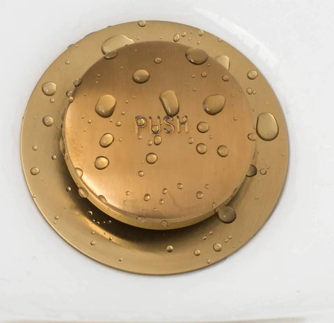 Tip Toe Bathtub Drain Trim Set With Two Hole Overflow Faceplate Replacement Bath Drain Kit With Universal Fine Coarse Thread Brushed Gold Finish For Easy Tap To Close And Seamless Bath Upgrade, showing brushed gold push-to-close drain plug