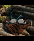 Steel Mesh Anti Fog Safety Goggles 30 Mesh Eye Protection for Arborists and Loggers on gloves with wood background