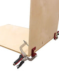90 Degree Corner Clamp With Swivel Head attached to plywood for cabinet making and precise positioning of right angle joints.