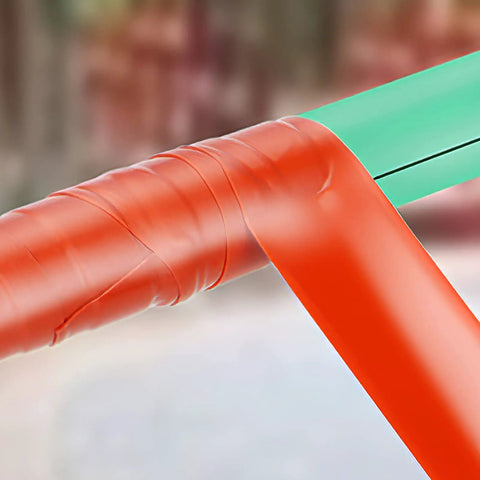 Close-up of Heavy Duty Waterproof Seal Tape 5 Pack For Outdoor Use Leak Stop Pipe Repair Duct Tape on green pipe