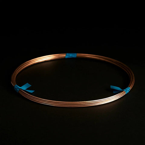 High Copper Solder Wire, 18 Gauge (0.040 In) 10 Foot Coil, Self Fluxing No Fuss Easy Feed For Quick Soldering, coiled on table