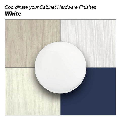 Round white handle on wood and navy background with text 'Coordinate your Cabinet Hardware Finishes White'