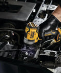 12V Max 3/8 Inch Cordless Impact Wrench Kit delivering hella tight torque in a mechanic's hand while working on a car engine.