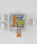 Premium Heavy Duty 2 Conductor Compact Wiring Nuts Clear Housing in junction box with various wire colors connected.