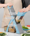 Safe Mandoline Slicer 5-in-1 adjustable vegetable chopper in blue with detachable blades, side view
