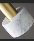 Close-up of HLRCB Indoor Pendant Light, Marble Adjustable Drop, showcasing marble base with brass hardware.
