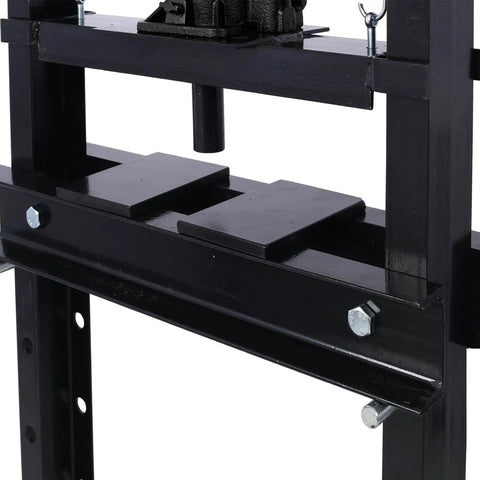 Close-up of Tough As Nails 12 Ton Hydraulic Shop Press with adjustable plates and steel frame for mechanics use.