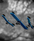 Crack Jack Windshield Repair Tool for Long Cracks Durable Auto Glass Quick Fix with blue devices on a cracked windshield.