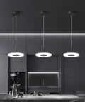 Dope Modern Black Pendant Lights Set Of 3 With LED 6000K Cool White Ceiling Fixtures in a minimalist gray kitchen