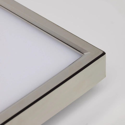 Close-up of Dope 17 Inch LED Flush Mount Ceiling Light, showing square shape and polished nickel finish corner detail.