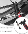 Universal Bike Chain Tool And Breaker For Road And Mountain Bikes shown with chain attached, compact portable design in use.