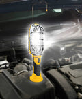 Ultra Bright Cordless LED Work Light With Magnetic Base 500 Lumens Battery Powered AA Batteries Included Handy On The Go Compact Handheld Flashlight illuminating car engine