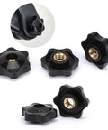 Five black six-lobed clamping knobs with brass 1/4-20 female threads for jig use