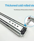 Heavy Duty Full Extension Drawer Slides Equipped With Smooth As Silk Ball Bearings And Built Different Steel Tracks For Quiet Cabinet Gliding And Heavy Lifting Power, showing thickened cold rolled steel.