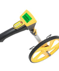 Badass Digital Measuring Wheel Telescoping Handle Up To 99999 Feet Meters Walking Survey Tool With Bright Screen And Data Storage Easy Roll For Landscaping Jobs, showing wheel and digital display.