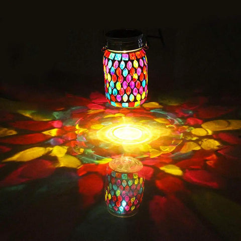 Outdoor Mosaic Lanterns Solar Powered Hanging Lights, Rechargeable Mason Jar Style Night Lights With Warm White Glow casting vibrant patterns