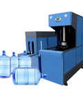 Heavy Duty Semi Automatic Blow Molding Machine For Plastic Bottle Production with blue PET bottles beside it.