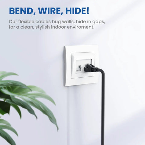 Black High Speed Cat6 Ethernet Patch Cable 6 Ft 2 Pack for Indoor Outdoor Use plugged into wall outlet.