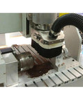 Heavy Duty 80 Mm Cnc Dust Shoe With Thick Nylon Brush For Router Spindle Workhorse Grade Vacuum Setup attached to CNC router.