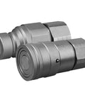 Close-up of 3/4-inch SAE skid-steer Bobcat flat-face hydraulic quick-connect couplers with dust caps