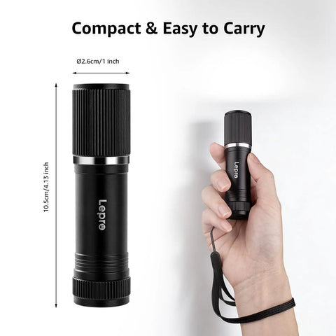 Compact LED Mini Flashlight With Tiny But Mighty Brightness held in hand showing size and lanyard