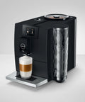 Smooth Operator Fully Automatic Coffee Machine Featuring A Smart Touchscreen And One Touch Milk Drinks In Polished Metropolitan Black, brewing a latte.
