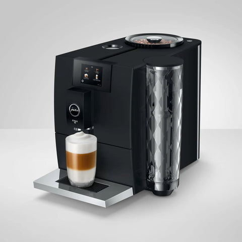 Smooth Operator Fully Automatic Coffee Machine Featuring A Smart Touchscreen And One Touch Milk Drinks In Polished Metropolitan Black, brewing a latte.