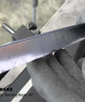 Close-up of Compact 8 Inch Manual Sheet Metal Shear And Brake Combo for 20 Gauge Steel forming precise 90 degree bends.