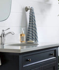 Elmhurst No Fuss Single Handle Bath Faucet Chrome Finish for 1 or 3 Hole 4 Inch Install on modern bathroom countertop.