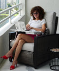 Woman using Portable Lap Desk And Workstation With Adjustable Height And Tilt, PVC Leather Finish, Non Slip Desktop, White on balcony