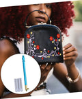 Woman holding embroidered purse with Beginner Friendly Embroidery Hook Needle Set With Non Slip Metal Handle Punch Needle Kit
