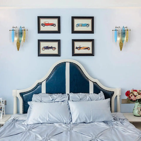 Mid Century Modern Boho Crystal Wall Sconce Golden Brass Adjustable Retro Wall Lamp in a bedroom with blue accents