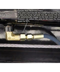 Close-up of Cylinder Flow Restrictor Valve in Heavy Duty Four Post Car Lift With Matching Sliding Jacks Black Powder Coated Steel Garage Auto Hoist System.