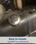 Close-up of silver metal gas cap on Kawasaki Mule fuel tank