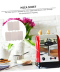Two Sets Of Seven Microwave Mica Plates For Heat Insulation Replacement next to a red toaster in a kitchen.