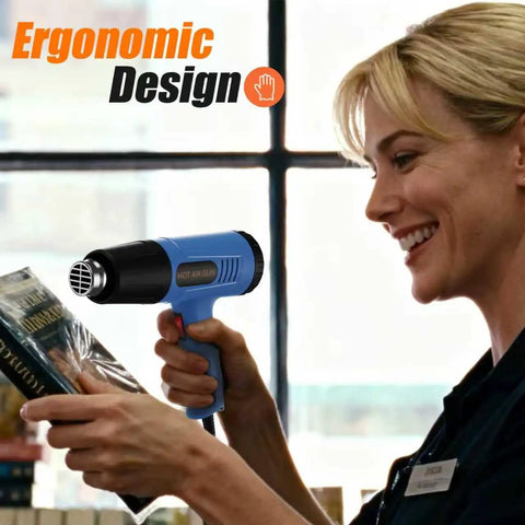 Person using Dual Temperature Heavy Duty Heat Gun With Four Pro Grade Nozzles for shrink tubing, ergonomic design in use.