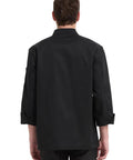 Back view of a solid black long sleeve chef coat, featuring breezy breathable fabric for intense kitchen heat.