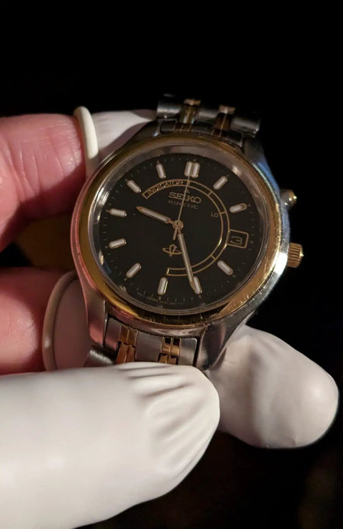 Inspecting watch with Latex Finger Cots Disposable Medium Size Rolled Edge Protectors for Fingertips Thumb Covers