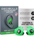 Custom molded earplugs with 31dB noise reduction rating, green, shown with packaging for loud environments like shooting and concerts.