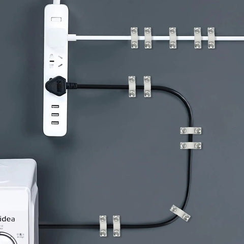 24 Piece Wire Shelf Clip Kit With Screws And Expansion Tubes used to secure cables against a dark wall