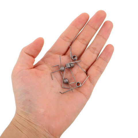 Top Tier Stainless Steel Torsion Springs Kit Perfect For Trash Can Lid Repair And DIY Projects This Heavy Duty Set Boasts High Torque Strong Corrosion Resistance And Super Reliable Compatibility To Fix Your Gear Fast. stainless steel torsion springs in hand