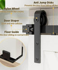 Close-up of Three Foot Mini Barn Door Hardware Kit for Sliding Single Door in J Shape, showing nylon wheel and anti jump disks.