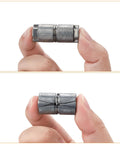 Close-up view of a 24 Pack Double Expansion Shield Anchors For Concrete Brick And Block Internal Thread One Quarter Inch Length One And A Quarter Inch External Diameter One Half Inch Zinc Alloy Heavy Duty Inside Screw Anchors.