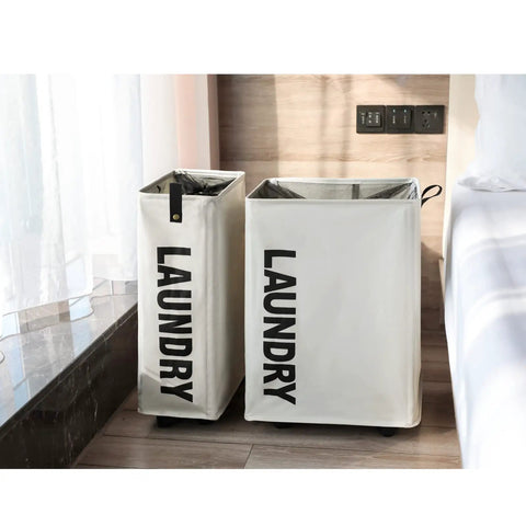 Two beige collapsible laundry hampers with "LAUNDRY" text, perfect for home or dorm use, featuring wheels and brakes for easy mobility.