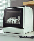 Fully Automatic Portable Countertop Dishwasher Crafted From Premium Stainless Steel on counter with dishes inside and LED display.