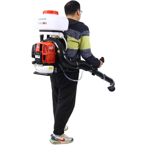 Person wearing gas powered backpack sprayer and cold fogger with 51.7cc engine and 14L tank for garden spraying.