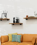Ten Inch Floating Shelf Brackets Set Of Six Built Tough Heavy Duty Rustic Industrial Hidden Metal Brackets For Strong Wall Shelves Three In One Design supporting decorative items above a couch